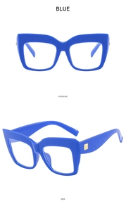 Macro detail of blue cat-eye glasses frame with golden square metal temple accents