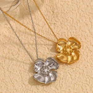 Vintage flower necklaces in gold and silver finish with matte hammered textures