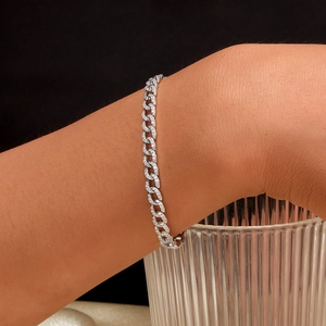 Close-up of S925 sterling silver chain bracelet with micro-paved cubic zirconia