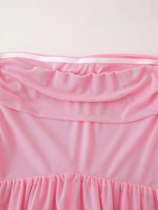 Detail view of pink mesh dress featuring an inner non-slip silicone strip for secure fit
