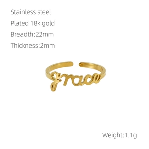Detail of 18k gold plated stainless steel ring with grace calligraphy text design