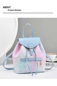 Detail of floral gradient leather backpack featuring metal pendant and secure drawstring