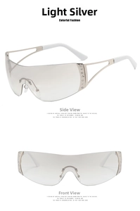 Detail einer randlosen Y2K-Sonnenbrille mit hellsilbernen Gläsern und Strasssteinen