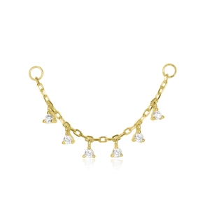 Close-up of gold S925 sterling silver chain with six round-cut white zirconia gemstones