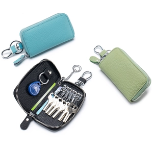 Astuccio portachiavi in vera pelle con 6 ganci e cerniera in blu, nero e verde