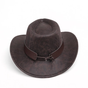 Detail of vintage brown suede cowboy hat featuring realistic leather texture and trim