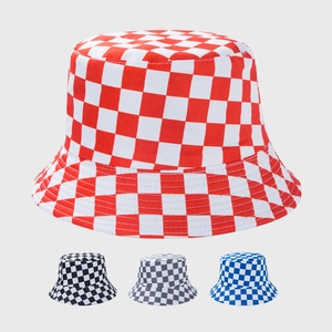 Detail showing checkered bucket hat in red, black, gray and blue patterns