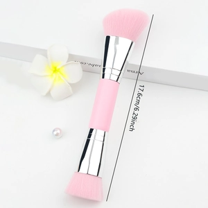 Macro detail of dual-ended makeup brush showing dense pink bristles and 17.6cm length