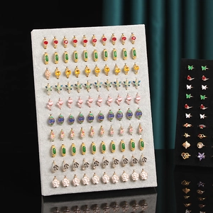 Creative velvet ring and earring display frame with colorful floral jewelry studs