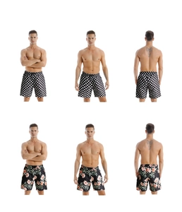 Mens quick-dry swim trunks featuring black polka dot and pink floral print patterns