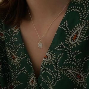 Minimalist 925 sterling silver necklace with vintage floral relief oval pendant