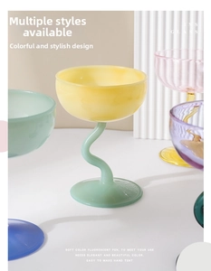 Detail of creative S-shaped colored glass stemware for desserts and cocktails