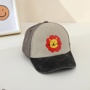 Kids color-block cotton baseball cap featuring a cute cartoon lion print in neutral tones