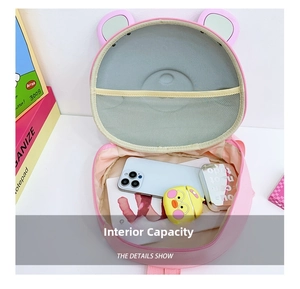 Detail of kindergarten backpack interior with mesh pocket and spacious storage compartment