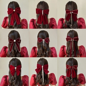 Elegant red velvet bow hair clips collection with pearls and gold chains for women