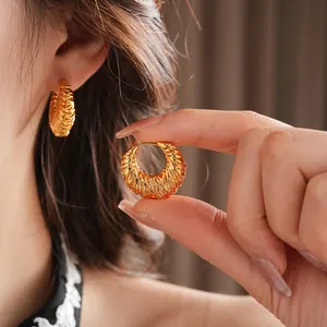 18k gold plated round hollow earrings with textured sunburst feather pattern for women