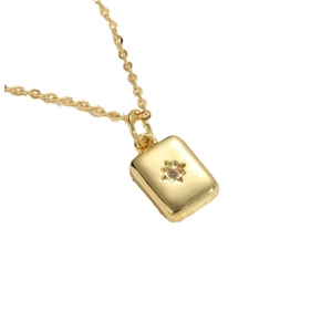 Elegant gold hexagon star zircon necklace with rectangular pendant on a white background