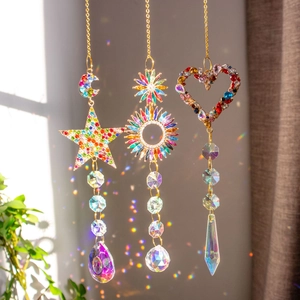 Rainbow crystal suncatcher set with gold chains featuring moon, star, and heart shapes
