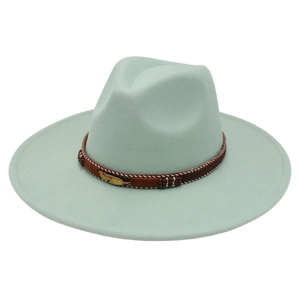 Detail of mint green wool felt fedora with brown braided band and golden feather pendant