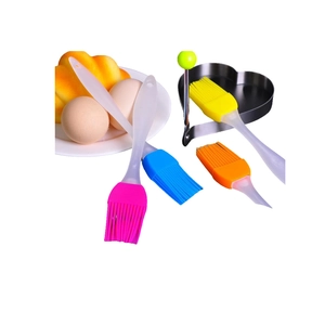 Set of four heat-resistant silicone BBQ basting brushes in pink blue yellow and orange