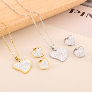 Sparkling heart necklace and earrings jewelry set in gold and silver finish with crystals