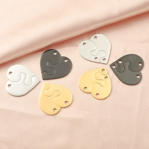 Polished heart puzzle pendants in silver, gold, and black steel for DIY jewelry