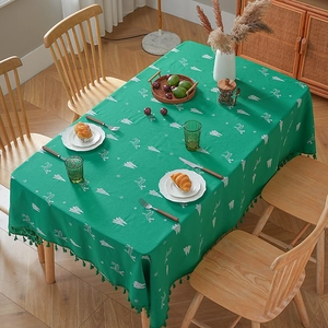 Green Christmas linen tablecloth with white elk, tree patterns and fringe tassels