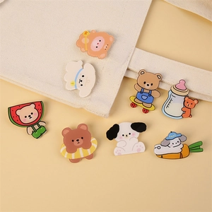 Cute cartoon acrylic bear and bunny badges set on white canvas bag accessory