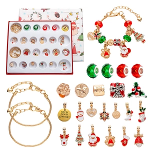 Christmas advent calendar with 24-day DIY jewelry set featuring gold bracelets and charms