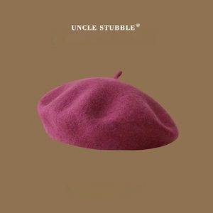 Detail view of high-quality Australian wool beret in deep burgundy with fine texture