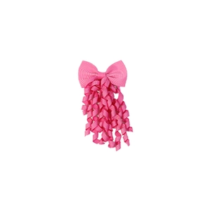 Detail of handmade pink grosgrain ribbon bow with spiral curly streamers for girls