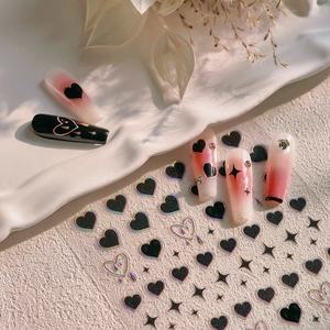Autocollants nail art rétro cœurs noirs et nœuds avec bords métalliques arc-en-ciel