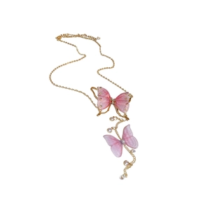 Pink tulle butterfly necklace with pearls and rhinestones on a gold chain