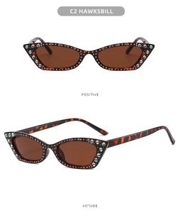 Detailed views of Hawksbill cat eye sunglasses with rhinestones from front and 45 degree angles