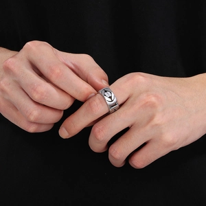 Minimalist hollow V-shaped stainless steel couple ring with silver metallic finish on hand