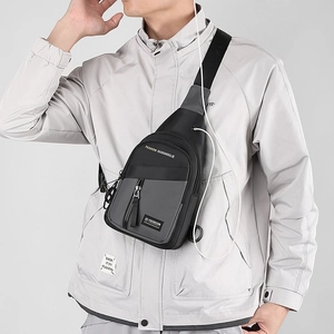 Men's fashion chest bag in black and grey, durable crossbody pack with earphone port