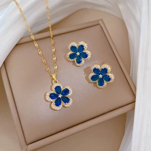 Luxurious gold-plated flower jewelry set with deep blue gems and micro-inlaid stones