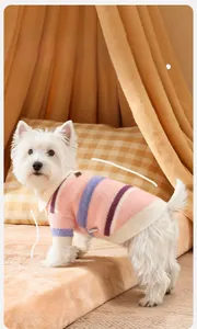 Detail of high-stretch striped pink and white knit pet sweater on a small dog