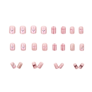 Pink cartoon press-on nails set with glitter bows and grid patterns for women