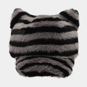 Detailed close-up of plush cat ears on the black and gray striped faux fur winter hat