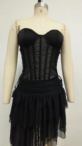 Detail of black tube top bodice with boning and tiered lace ruffled skirt set