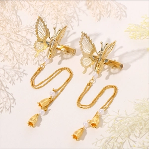 Elegant gold butterfly tassel hair clips with white pearls and lily of the valley charms