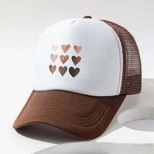 Brown and white mesh trucker hat featuring a 3x3 gradient heart pattern on front
