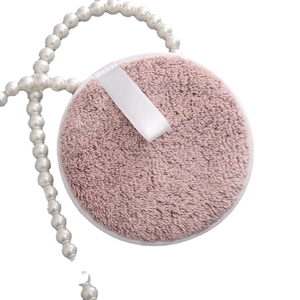 Reusable round pink bamboo charcoal fiber makeup remover pad with white ribbon loop