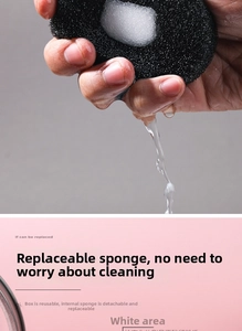 Close-up of a high-absorbent makeup brush cleaning sponge being squeezed to show water