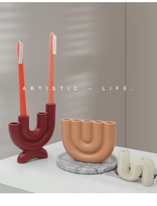 Artistic matte ceramic U-shaped candle holders and S-shaped decorative tray in minimalist style