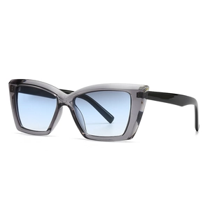 Modern square retro sunglasses with transparent grey frames and blue gradient lenses