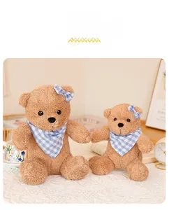 Detail view of 20cm and 30cm brown teddy bears with blue checkered scarfs and bows