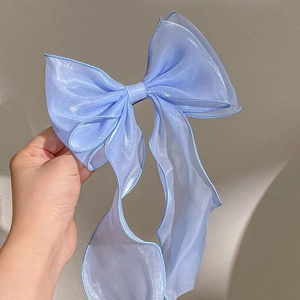 Elegant blue organza bow hair clip with flowing ribbons for women hair styling