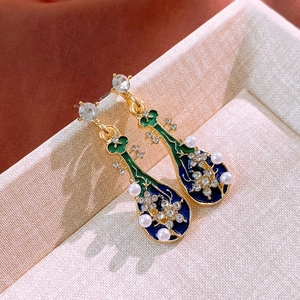 Chinese style pipa earrings with enamel coating and inlaid pearls in gold finish